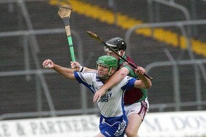 Kiltale's Stephen Whyte moves in on Kilmessan's Charlie Keena during the Meath SHC semi final at Pairc Tailteann