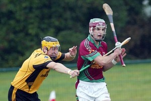 Kiltale's Mark O'Sullivan gets in his strike as Dunboyne's Paul Fagan tries to block during the Meath SHC quarter final replay at Trim.