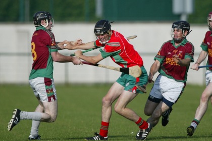 Killyon's Ger Foley is under pressure from Kiltale's Philly Garvey and Stephen Donoghue during the Meath SHC clash at Lomans Park